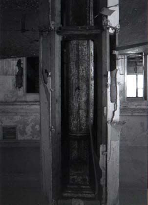 Closer to one of the pillars